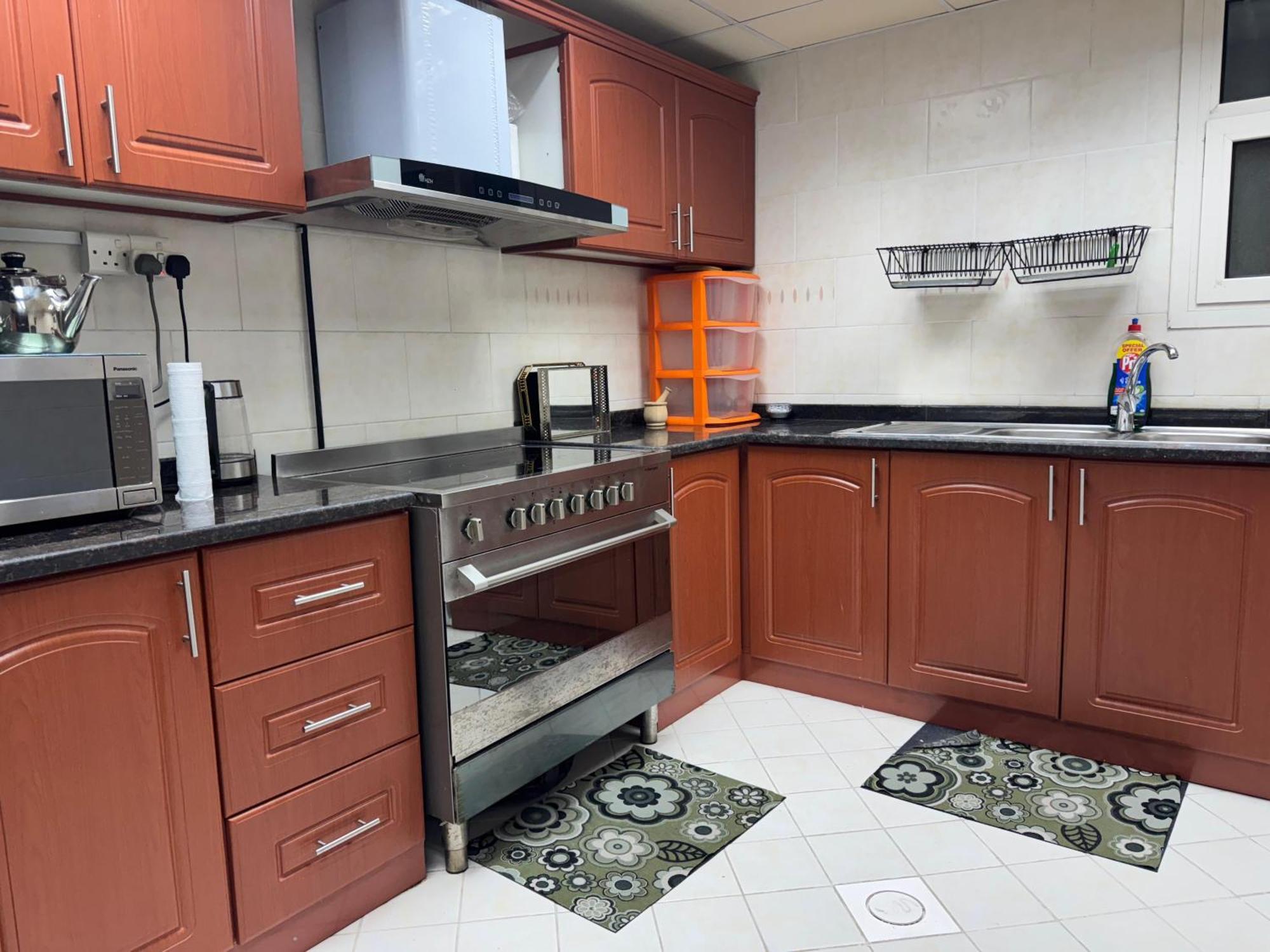 The Family Spot Apartment Шарджа Екстериор снимка