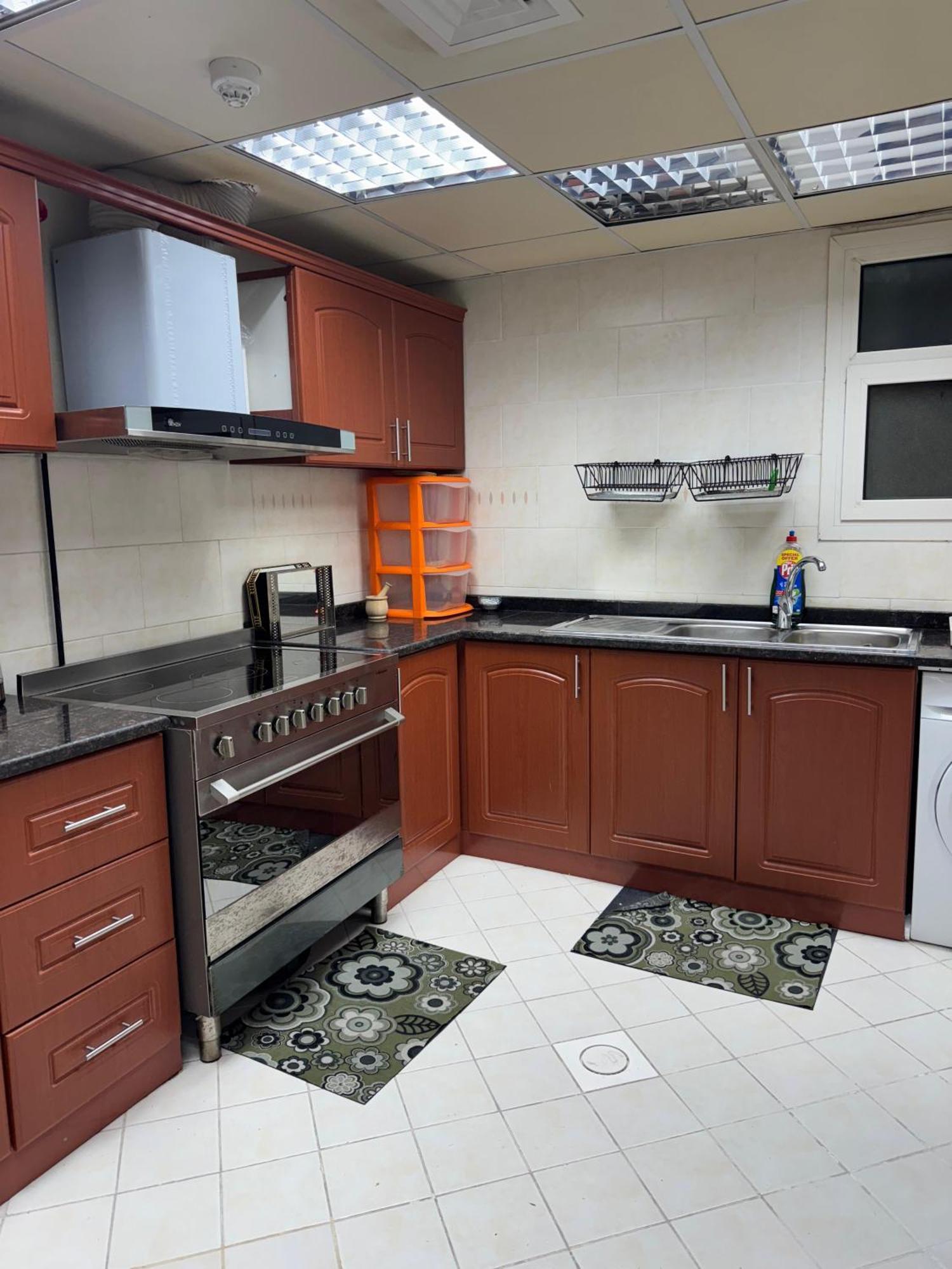 The Family Spot Apartment Шарджа Екстериор снимка