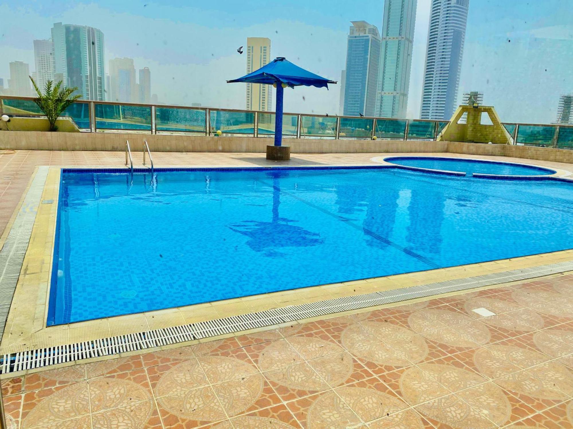 The Family Spot Apartment Шарджа Екстериор снимка